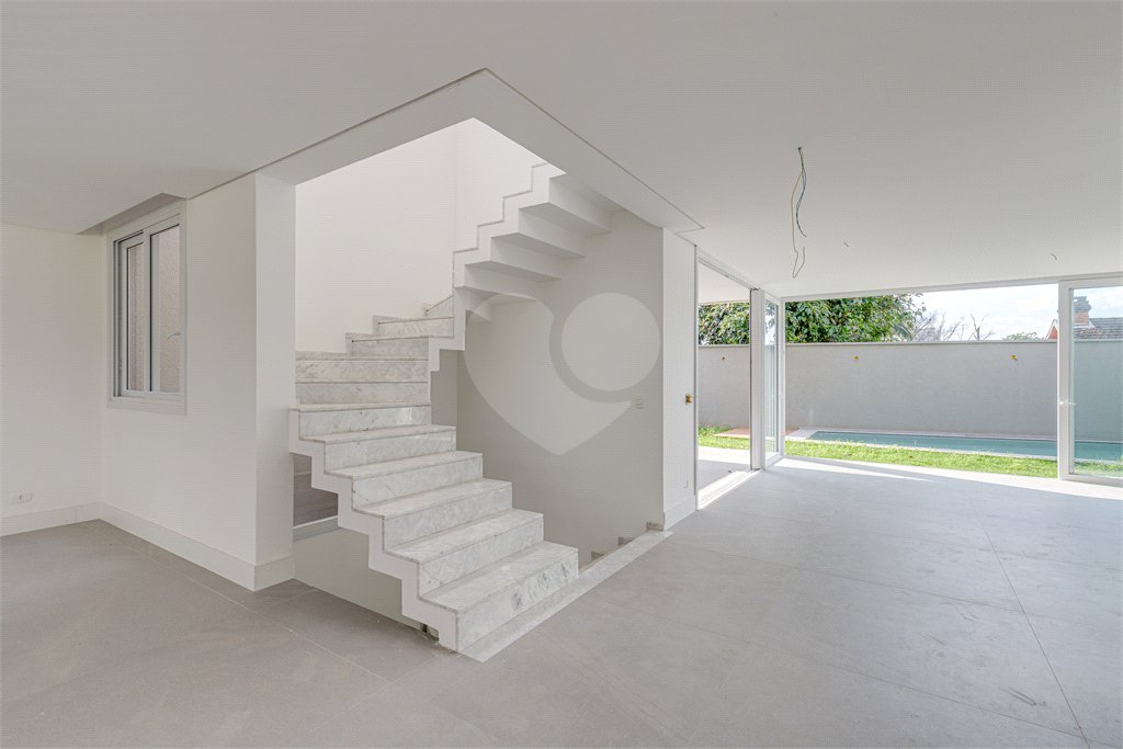 Casa à venda com 4 suítes no condomínio Vila Arese, São Paulo - SP