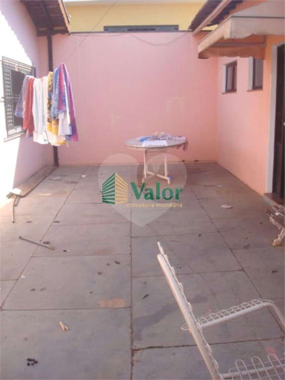 Casa com Edícula