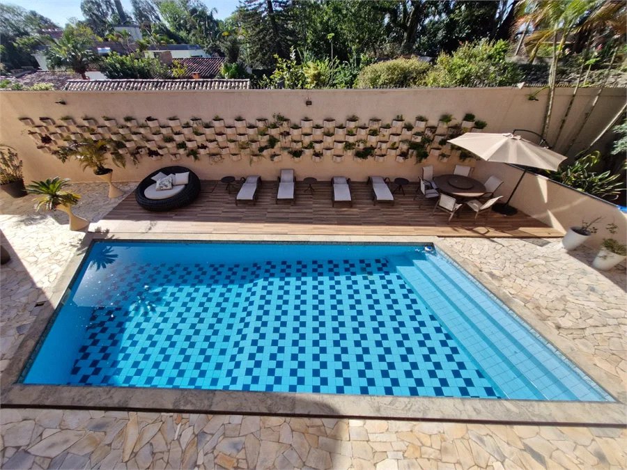 Casa à venda com 4 suítes no condomínio Villa Viana II, Cotia - SP