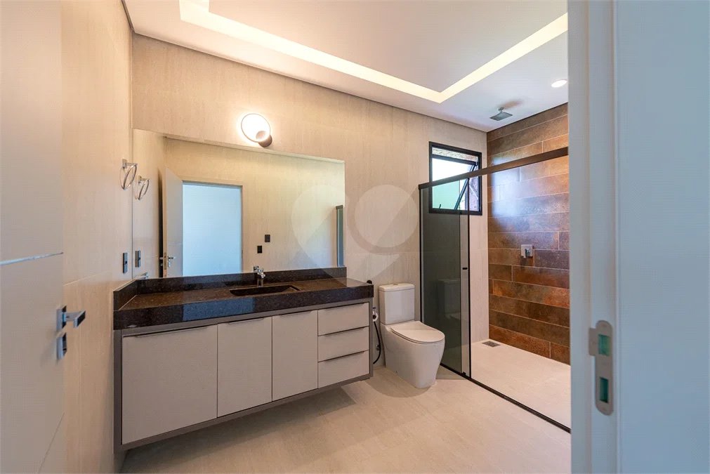 Casa à venda com 4 suítes no condomínio Vale da Santa Fé, Vinhedo - SP