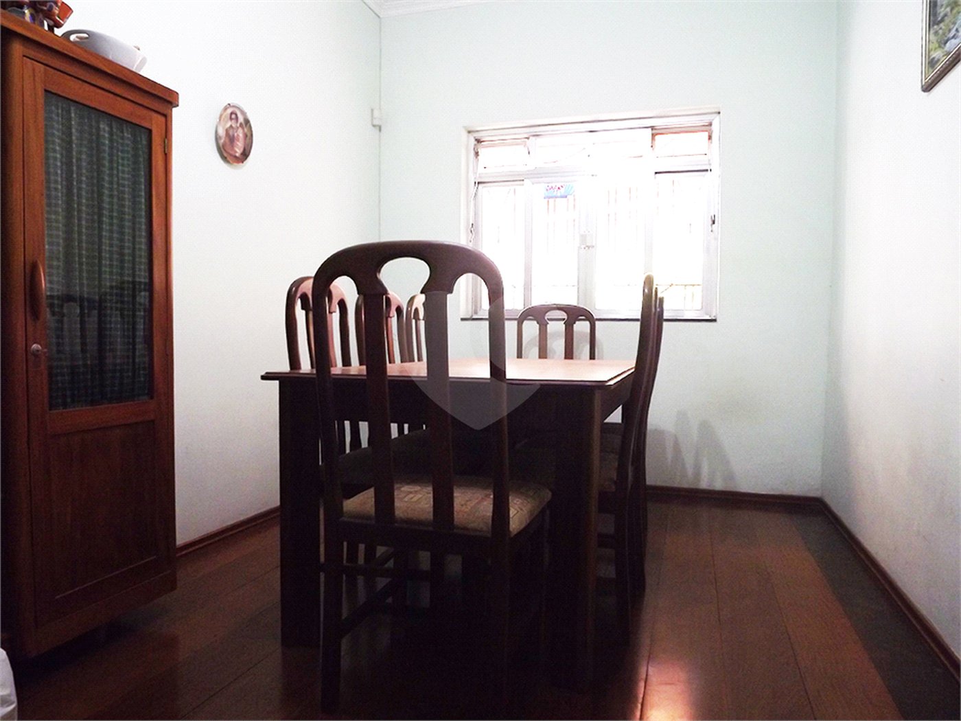 Casa de 318m2 com 2 suítes e 3 vagas à venda na Bela Vista