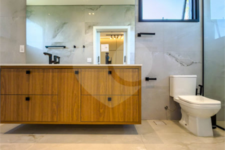 Indaiatuba - Quintas da Terracota - 1252 m² de terreno - casa térrea com 514 m² de área construída -3 vagas de garagem cobertas e 3 descobertas Lavabo - Sala de estar e jantar amplas e integradas - Escritório privativo - Cozinha toda equipada com geladeira, forno, micro-ondas, lava-louças,