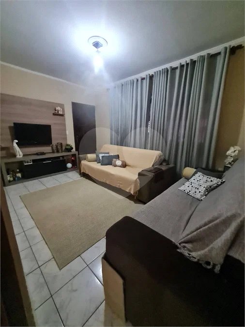Casa com 183m², 3 dormitórios, 2 vagas, à venda em Santo André