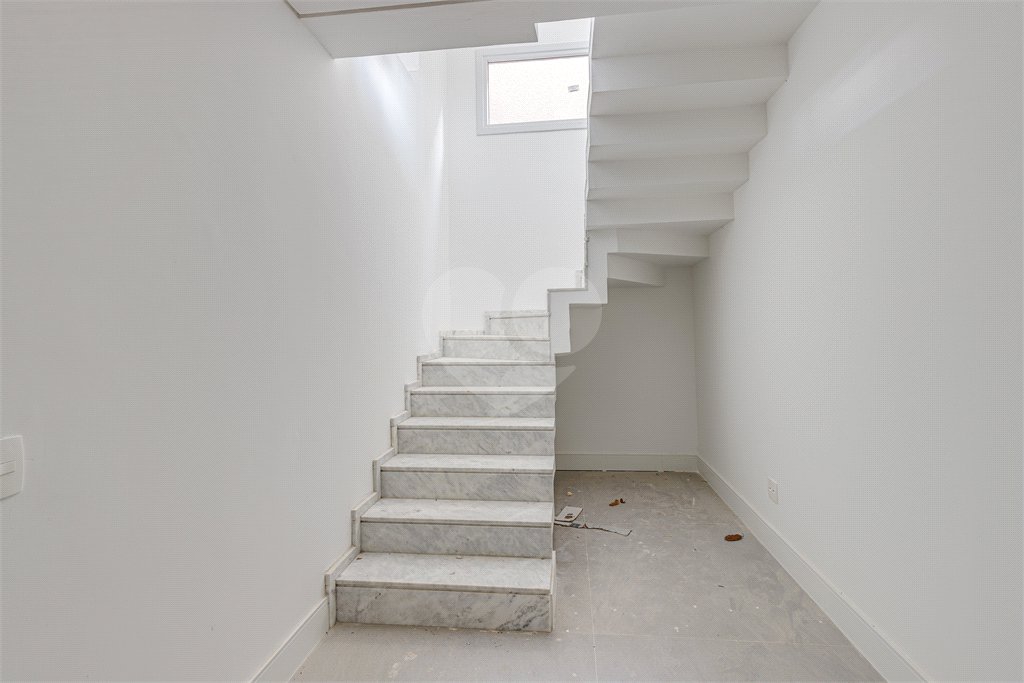 Casa à venda com 4 suítes no condomínio Vila Arese, São Paulo - SP
