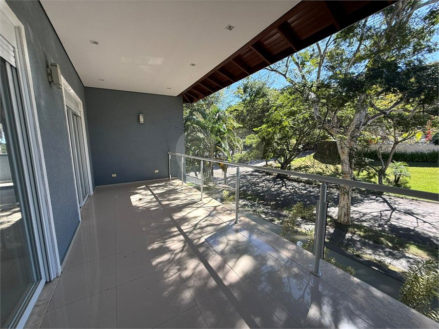 Casa alto padrão condomínio fechado em Atibaia com 4 suítes e ampla área de lazer, espaço gourmet, piscina, 6 vagas garagem