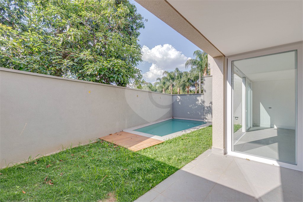 Casa à venda com 4 suítes no condomínio Vila Arese, São Paulo - SP
