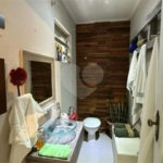 Casa com 400m², 4 dormitórios, sendo 3 suítes, 5 vagas de garagem, à venda na Vila Prudente.