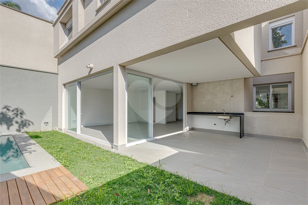 Casa à venda com 4 suítes no condomínio Vila Arese, São Paulo - SP