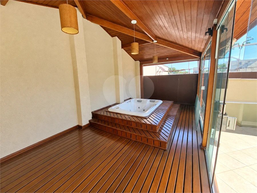 Casa à venda no Condomínio Estância Marambaia, Vinhedo | 3 suítes, piscina e terreno de 810 m²