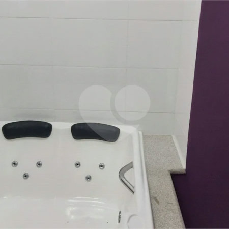 Sobrado com 224m² , 3 dormitórios , sendo 2 suítes , 3 vagas de garagem , 7 banheiros , à venda na Vila Scarpelli em Santo André.