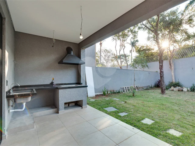 Casa à venda com 4 suítes no condomínio Reserva Robélia, São Paulo - SP
