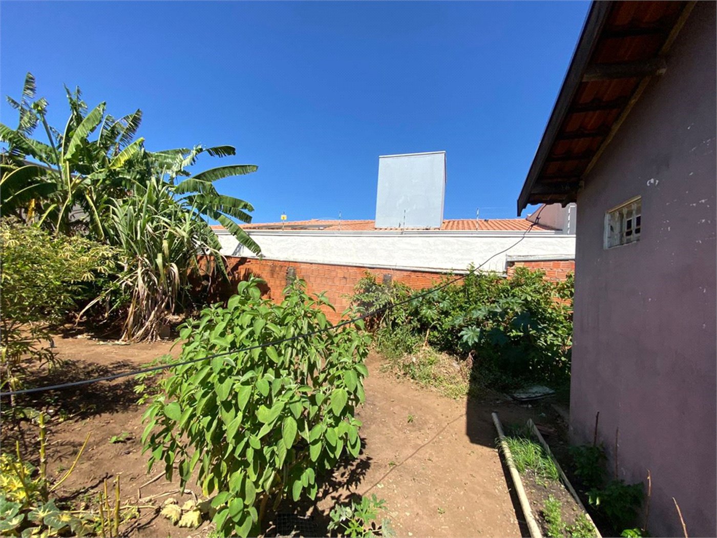 Casa e sala comercial na Vila Jacobucci