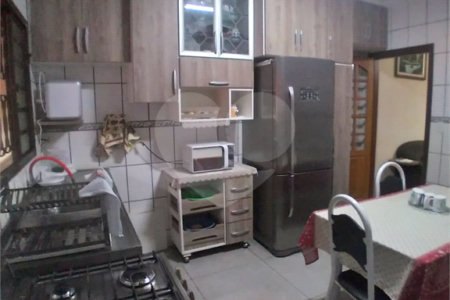 Casa + salão comercial na Vila Vista Alegre