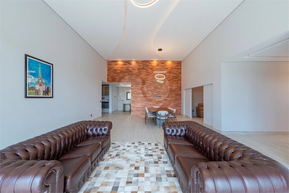 Casa à venda com 4 suítes no condomínio Vale da Santa Fé, Vinhedo - SP