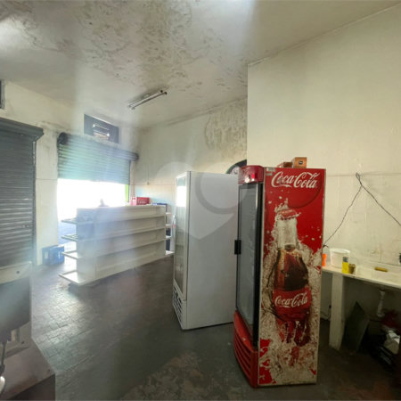 Casa térrea e salão comercial a venda no Jardim Bandeirantes.