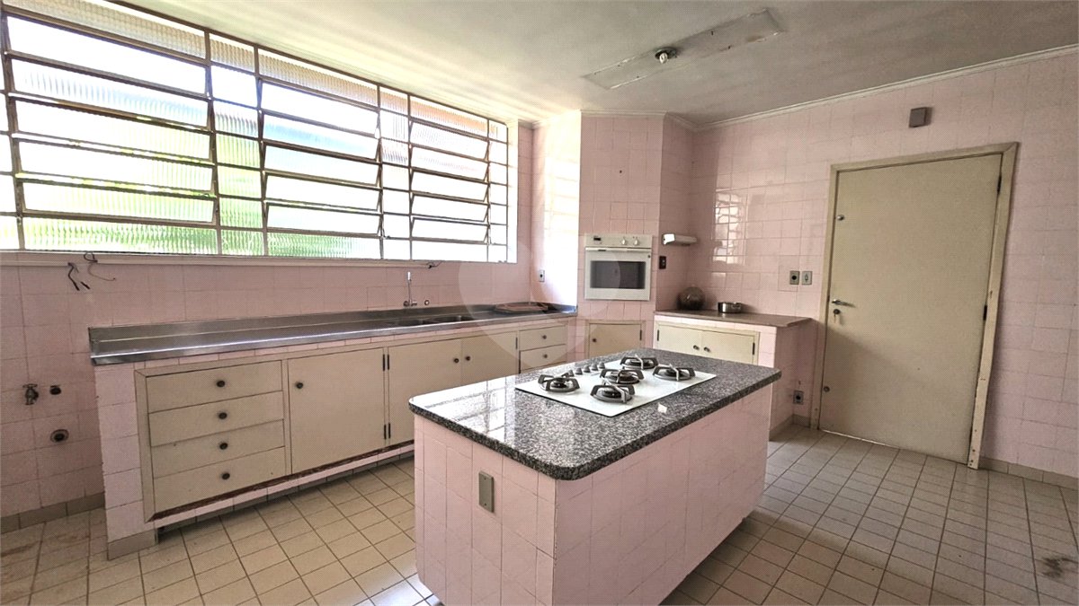 Casa à venda com 4 suítes no condomínio Chácara Cordeiro, São Paulo - SP