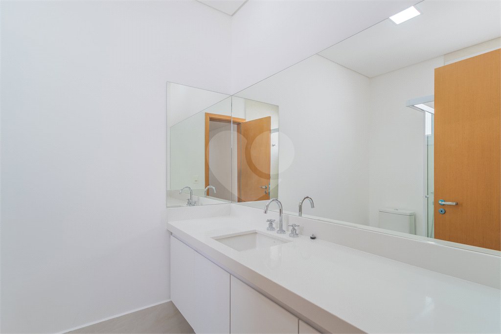 Casa à venda com 4 suítes no condomínio Villagio Quadrifolio, São Paulo - SP