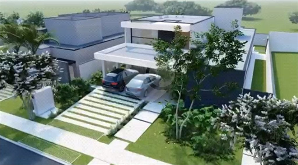 Terreno com casa em construção no Condomínio Alphaville I , em Ribeirão Preto/SP.