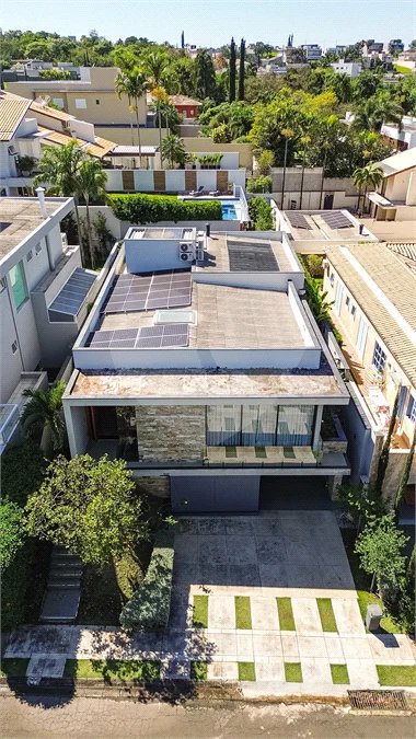 Indaiatuba - HOME DESIGN - Casa Térrea - Condomínio Paradiso - 420 m² de terreno - 307,19 m² de área construída - 3 suítes completas, sendo 1 master com closet planejado e banheira de imersão - Sala de TV reversível para 4ª suíte - Sala de estar ampla e varanda gourmet integrada - Cozinha com móve