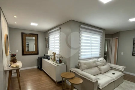 Apartamento de 100 m² à venda em Santo André, sem condomínio, com 2 quartos, 2 banheiros, móveis planejados, área gourmet e 1 vaga coberta e fixa. Excelente acabamento.