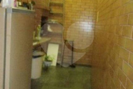 Casa térrea com salas comerciais em anexo à venda na região da Moóca