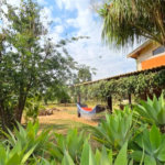 Refúgio de Alto Padrão em Condomínio Fechado: Natureza, Charme e 5.500m² de Terreno
