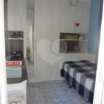 Casa térrea à venda na Vila Mazzei, em rua tranquila