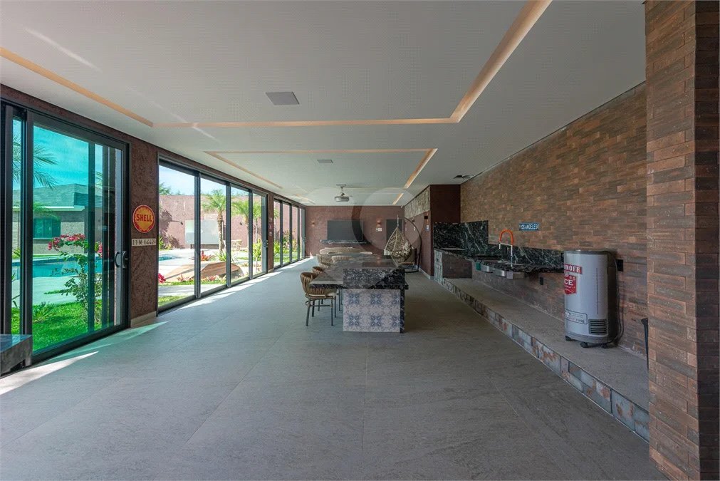 Casa à venda com 4 suítes no condomínio Vale da Santa Fé, Vinhedo - SP