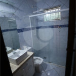 Casa com 4 Dormitórios e área de lazer com piscina
