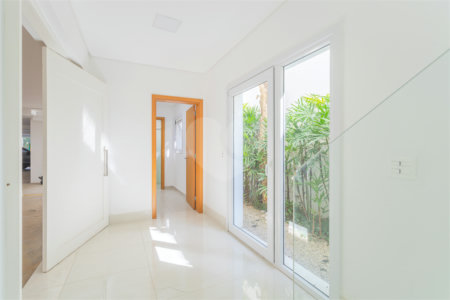 Casa à venda com 4 suítes no condomínio Villagio Quadrifolio, São Paulo - SP