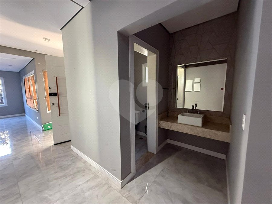 Casa alto padrão condomínio fechado em Atibaia com 4 suítes e ampla área de lazer, espaço gourmet, piscina, 6 vagas garagem