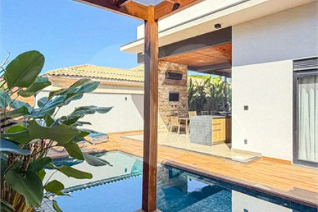 Indaiatuba - HOME DESIGN - Casa Térrea - Condomínio Paradiso - 420 m² de terreno - 307,19 m² de área construída - 3 suítes completas, sendo 1 master com closet planejado e banheira de imersão - Sala de TV reversível para 4ª suíte - Sala de estar ampla e varanda gourmet integrada - Cozinha com móve
