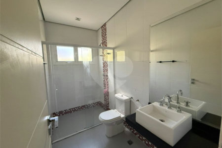 Casa alto padrão condomínio fechado em Atibaia com 4 suítes e ampla área de lazer, espaço gourmet, piscina, 6 vagas garagem