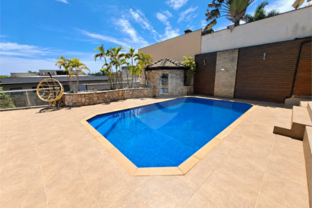 Casa à venda no Condomínio Estância Marambaia, Vinhedo | 3 suítes, piscina e terreno de 810 m²