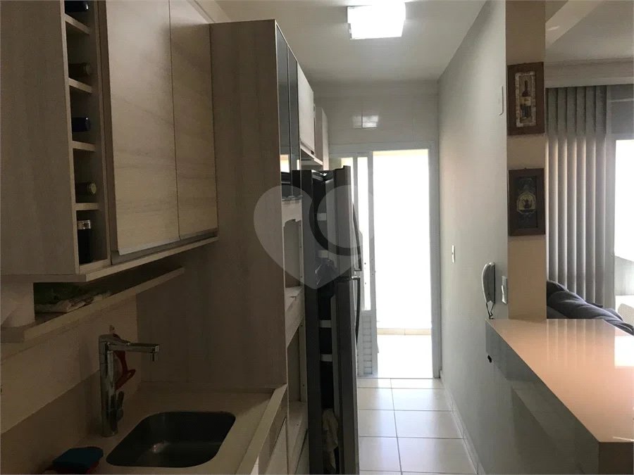 APARTAMENTO MOBILIADO EM FRENTE AO SHOPPING 02 DORMITÒRIOS