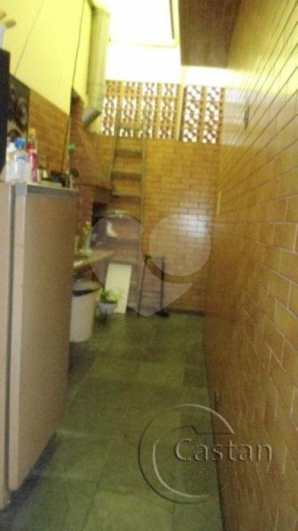 Casa térrea com salas comerciais em anexo à venda na região da Moóca
