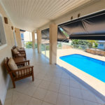 Casa à venda no Condomínio Estância Marambaia, Vinhedo | 3 suítes, piscina e terreno de 810 m²