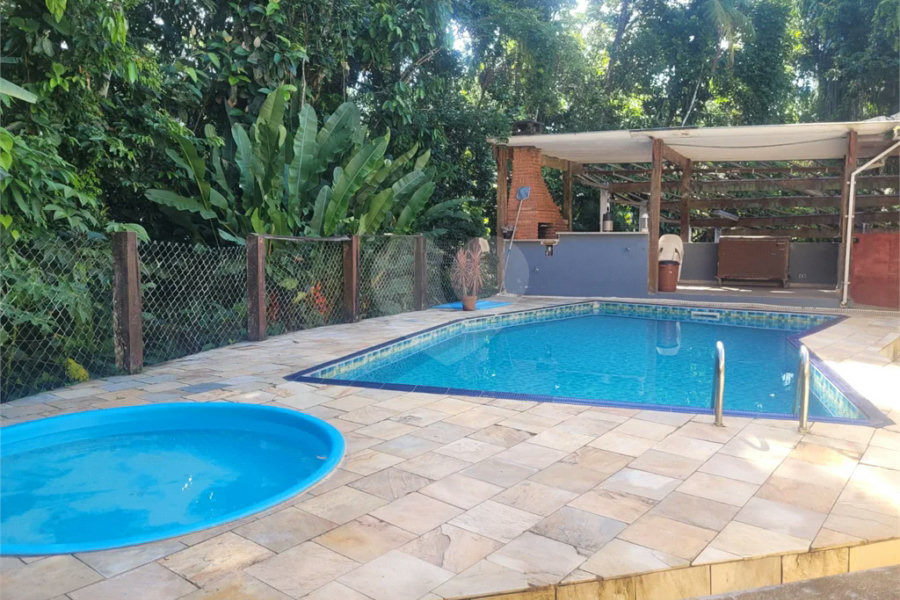 Casa à venda com 7 quartos, sendo 5 suítes, em Guaratuba, Bertioga, SP