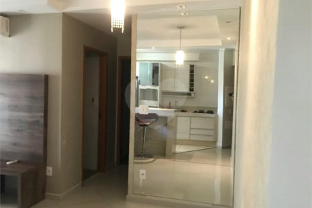 APARTAMENTO MOBILIADO EM FRENTE AO SHOPPING 02 DORMITÒRIOS