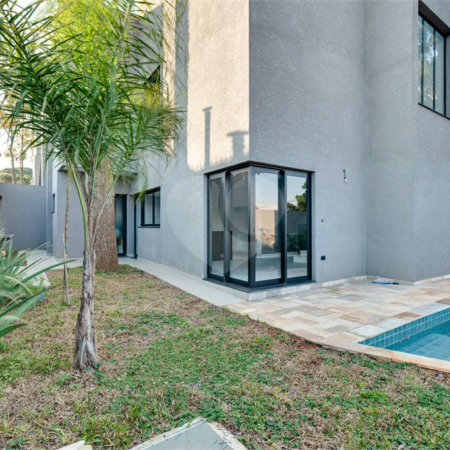 Casa à venda com 4 suítes no condomínio Reserva Robélia, São Paulo - SP