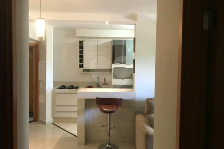 APARTAMENTO MOBILIADO EM FRENTE AO SHOPPING 02 DORMITÒRIOS