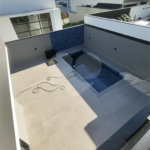 Casa com 3 suítes, piscina e área gourmet em terreno de 360m²