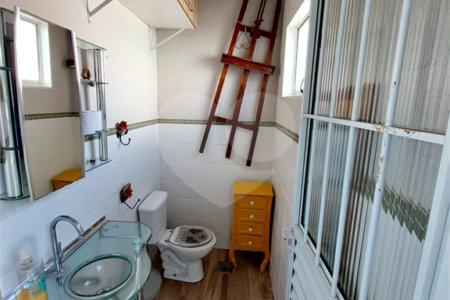 Casa residencial com ponto comercial a venda no Centro