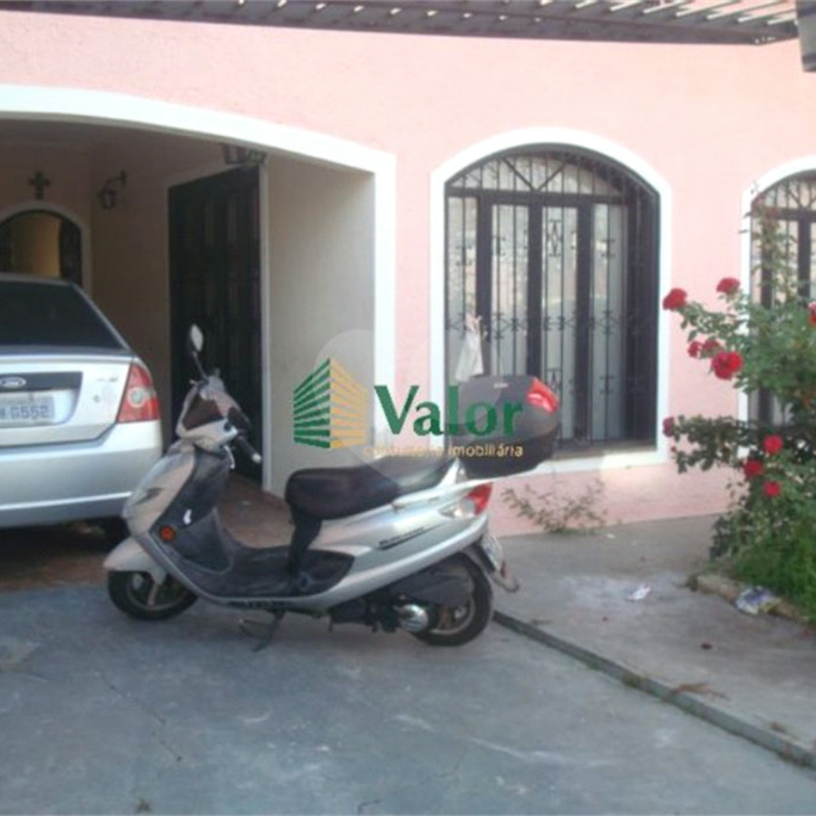 Casa com Edícula