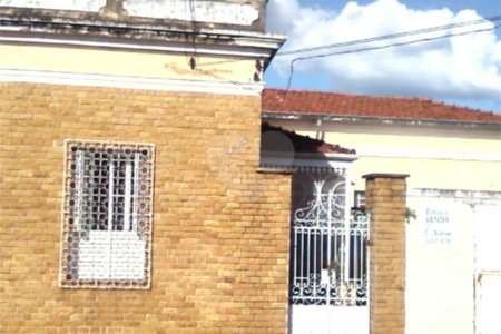 Terreno contendo 02 casas geminadas á venda.