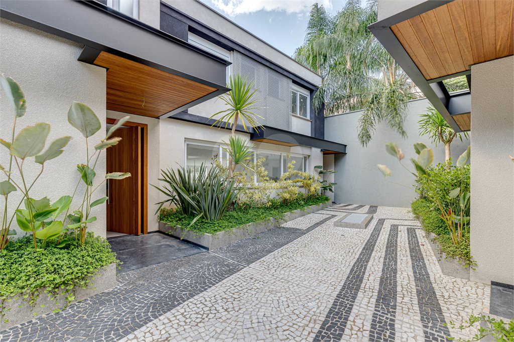Casa à venda com 4 suítes no condomínio Vila Arese, São Paulo - SP