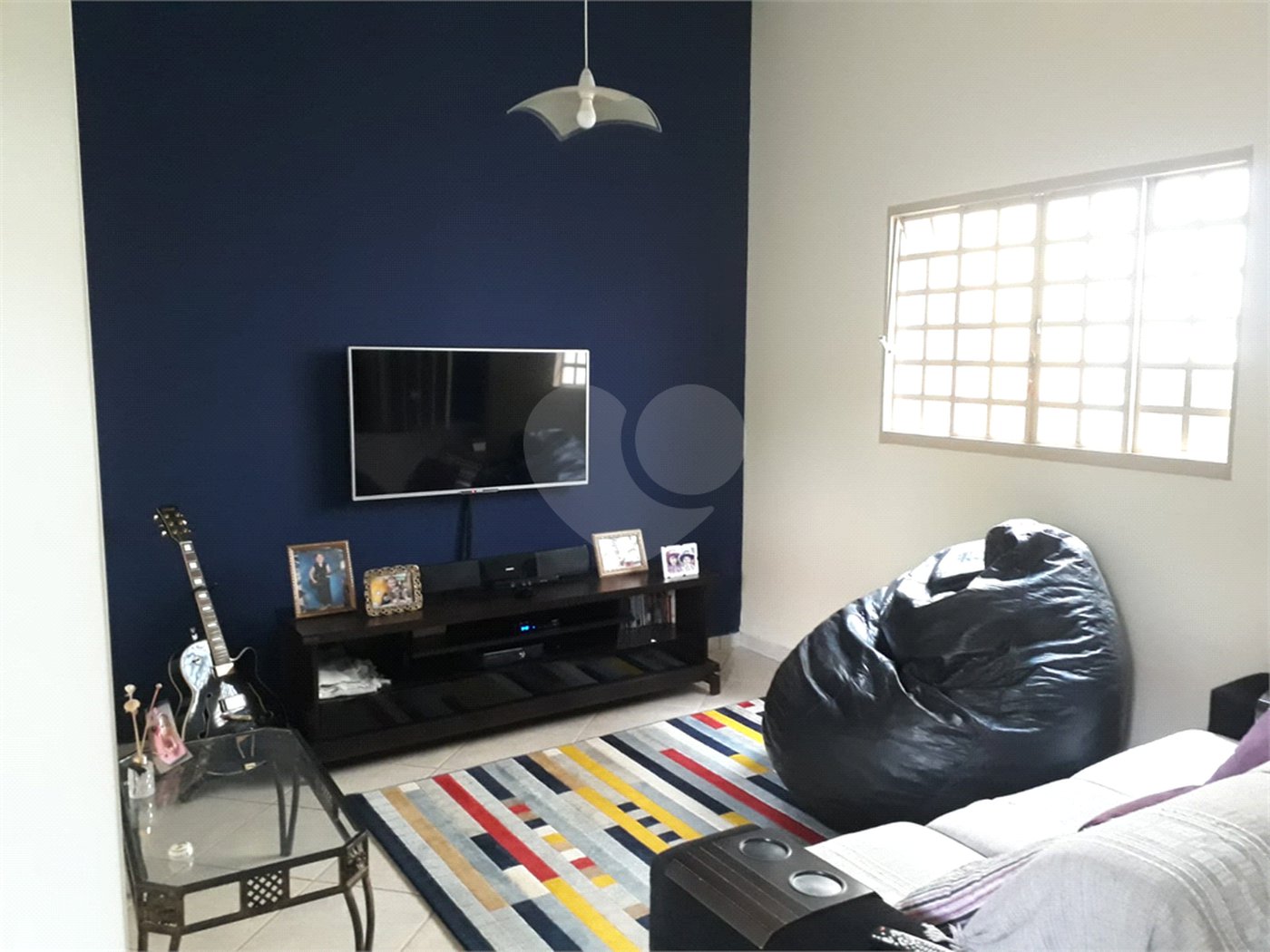 Sobrado com quintal amplo e arborizado a venda