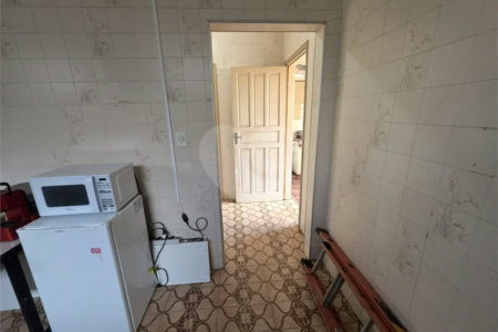 Casa térrea à venda com amplo quintal e grande potencial na Vila Nery