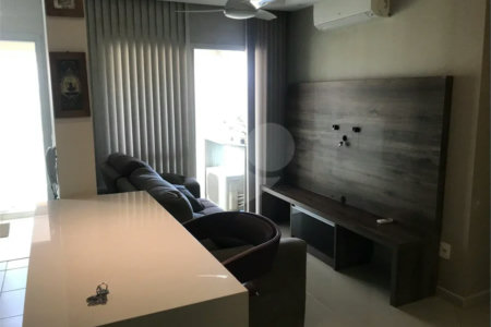 APARTAMENTO MOBILIADO EM FRENTE AO SHOPPING 02 DORMITÒRIOS
