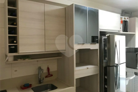 APARTAMENTO MOBILIADO EM FRENTE AO SHOPPING 02 DORMITÒRIOS